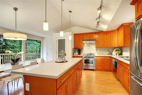 white quartz with oak cabinets